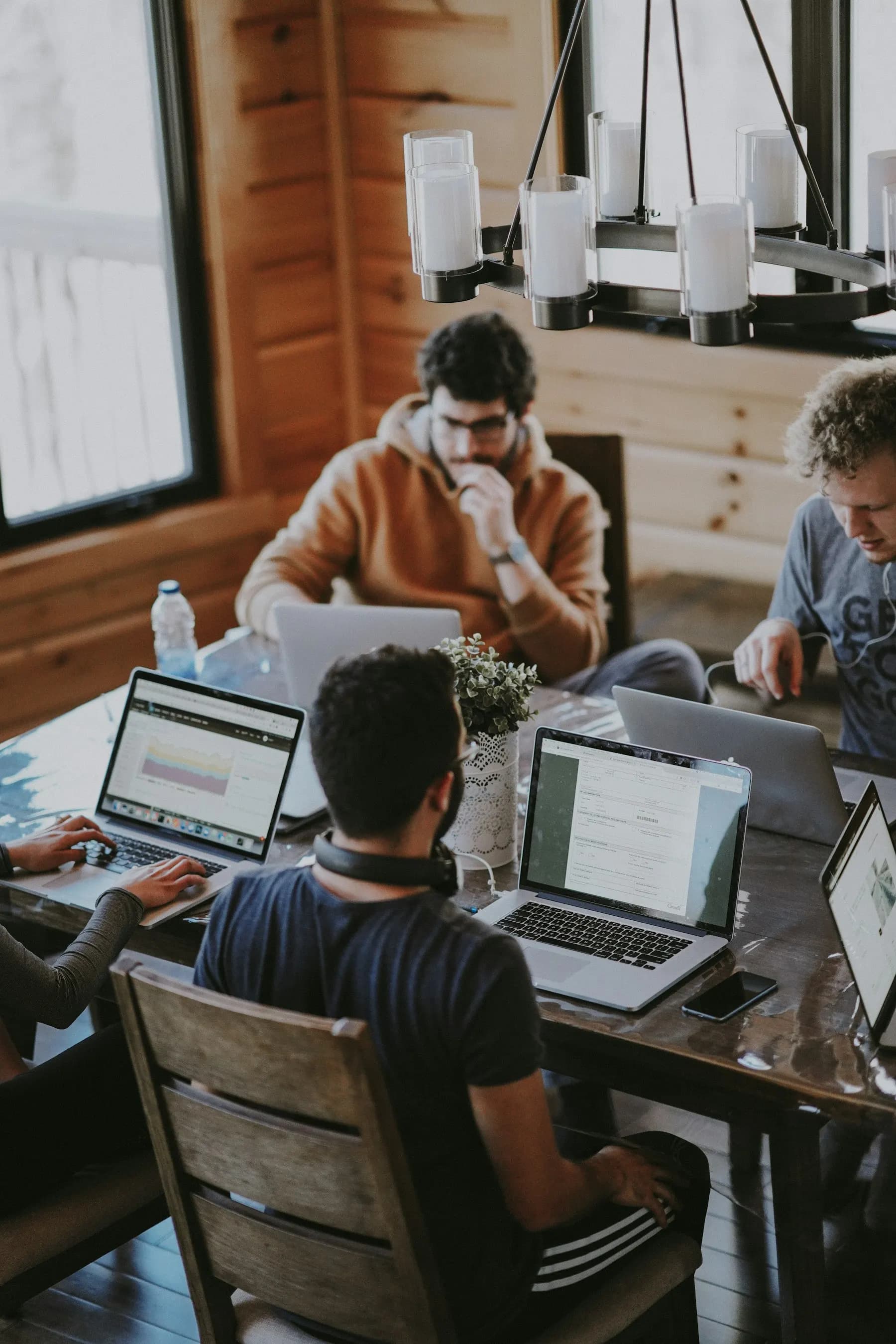 Business team discussing technology solutions in a professional workspace